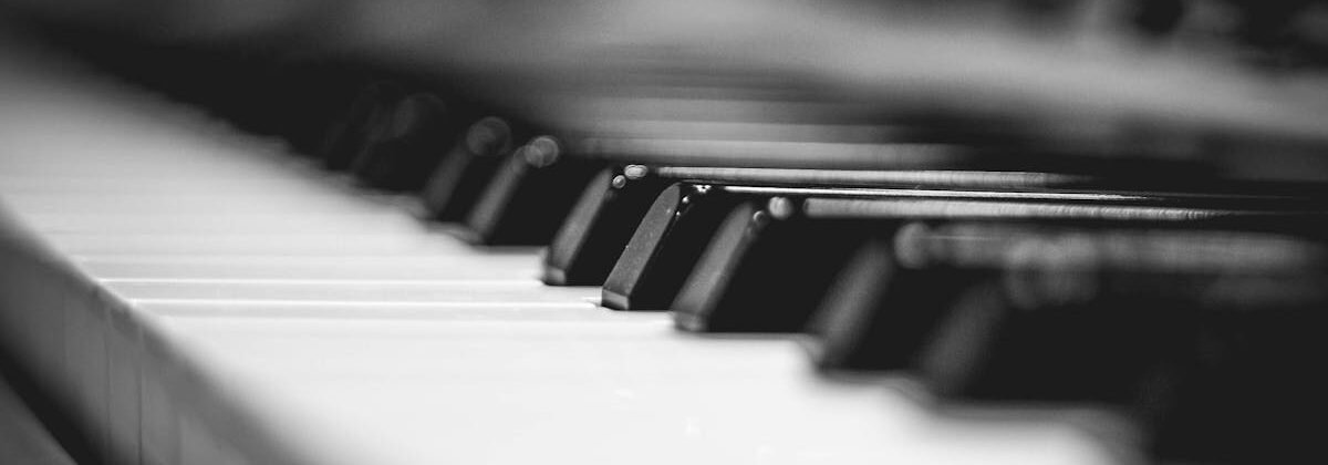 Elegant black and white close-up of piano keys, showcasing a monochrome artistic view.